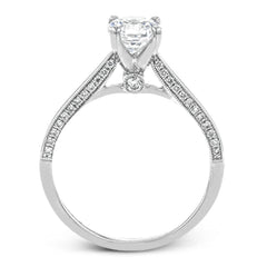 This absolutely stunning white gold engagement ring features a sleek design with .21 ctw of round white diamonds for a touch of glamour.