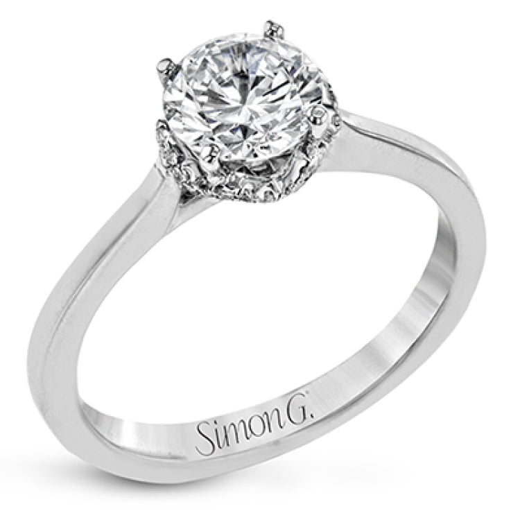 This lovely white gold ring features .09 ctw of round white diamonds for a subtle, sparkling accent.