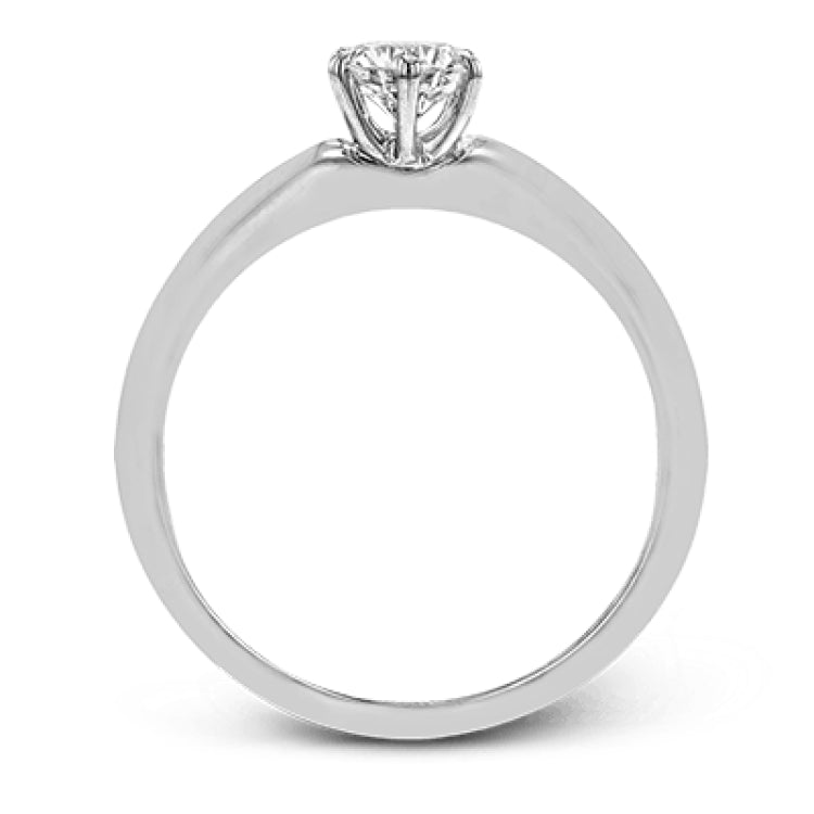 This contemporary, minimalist design in white gold is the perfect way to highlight a single round stone as a centerpiece.
