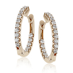 These elegant white gold earrings feature 1.95 ctw of white diamonds
