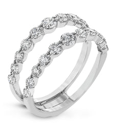 This 18k white gold engagement set certainly makes a statement with 1.72 ctw of white diamonds set in three rows.