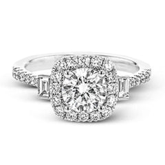 This white gold ring glitters with accents of .41 ctw of round white diamonds and .14 ctw of baguette shaped diamonds for a timelessly elegant look.