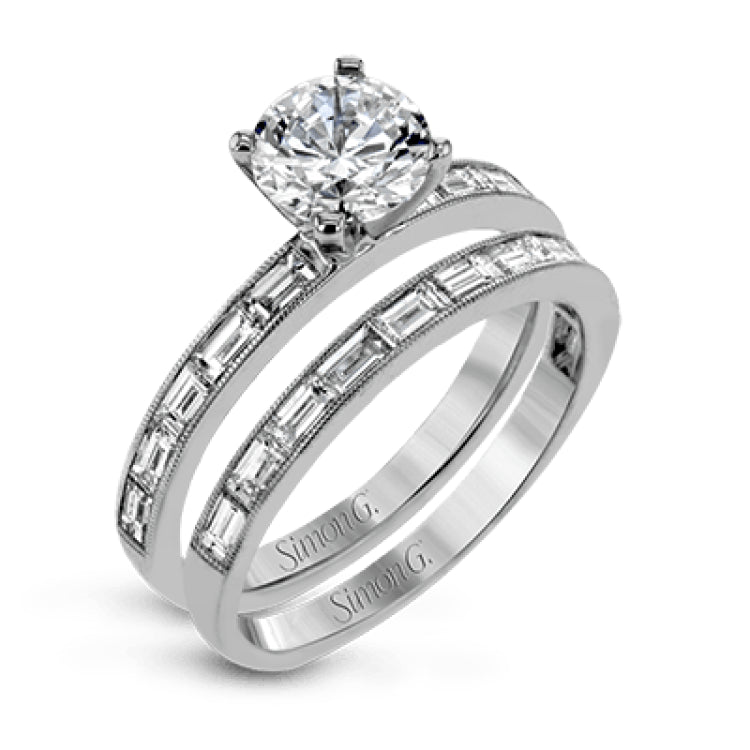 This sleek, minimalist white gold wedding set features a distinctive design with an impressive 1.05 ctw of baguette shaped white diamonds.