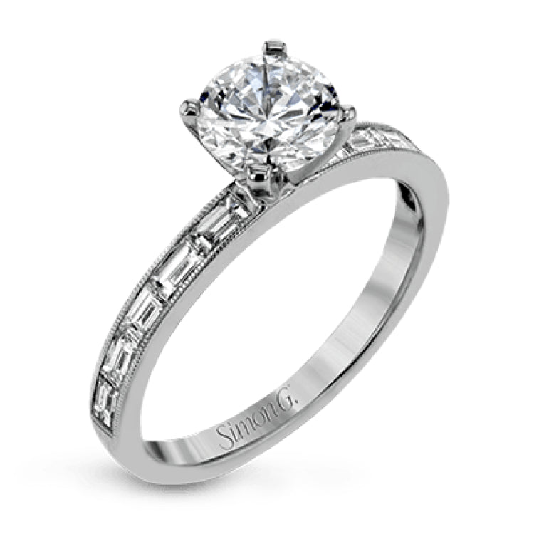 This sleek, minimalist white gold wedding set features a distinctive design with an impressive 1.05 ctw of baguette shaped white diamonds.