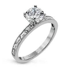 This sleek, minimalist white gold wedding set features a distinctive design with an impressive 1.05 ctw of baguette shaped white diamonds.