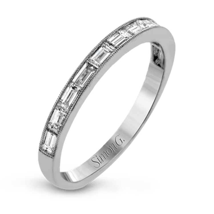 This sleek, minimalist white gold wedding set features a distinctive design with an impressive 1.05 ctw of baguette shaped white diamonds.