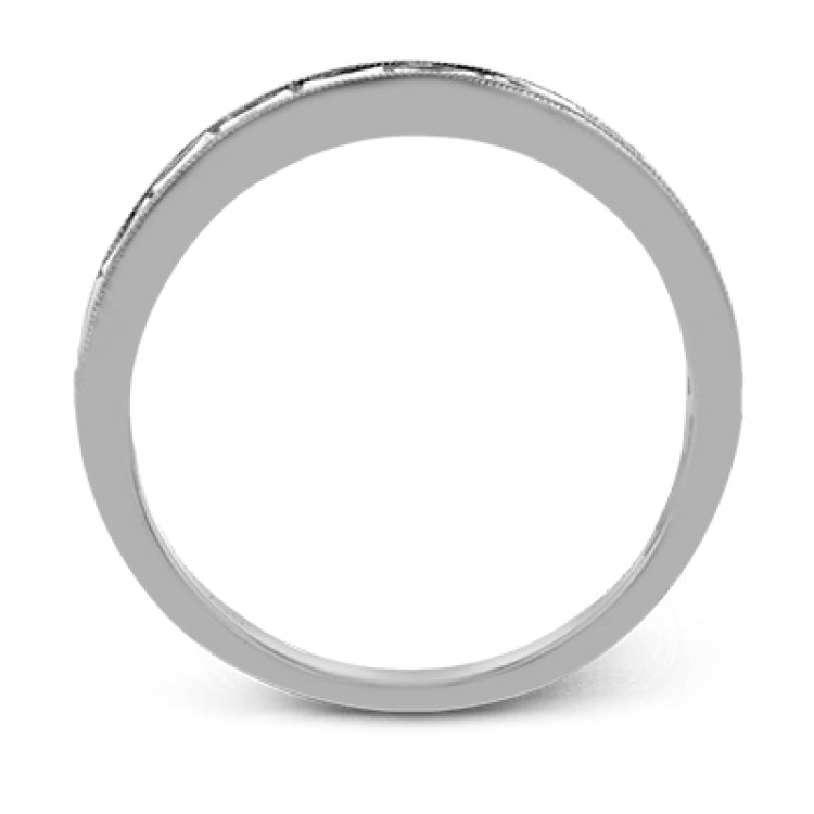 This sleek, minimalist white gold wedding set features a distinctive design with an impressive 1.05 ctw of baguette shaped white diamonds.