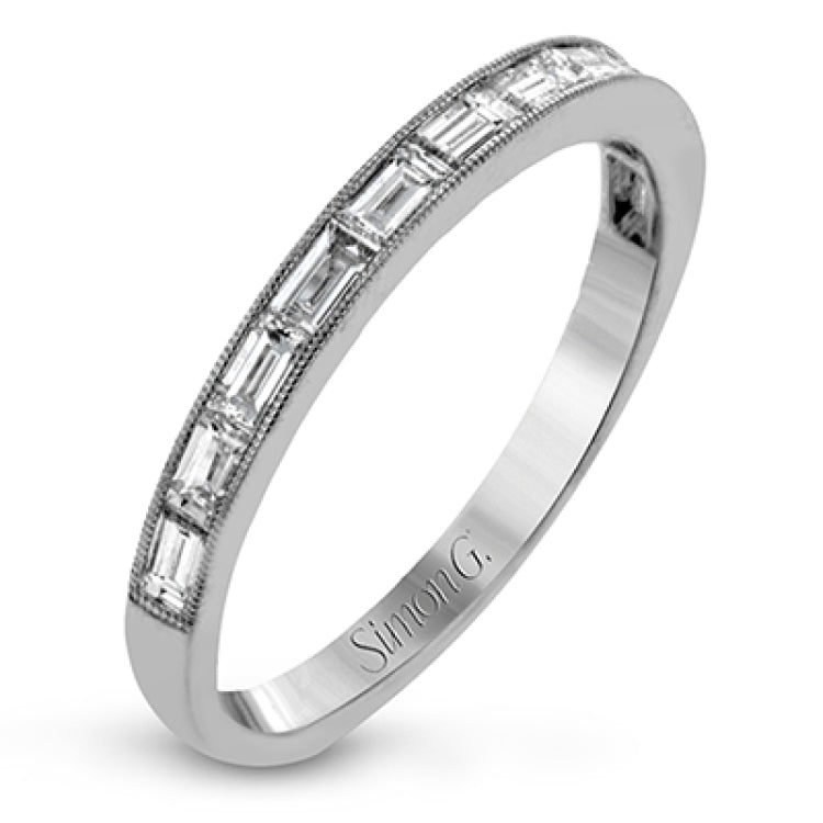 This sleek, minimalist white gold wedding set features a distinctive design with an impressive 1.05 ctw of baguette shaped white diamonds.