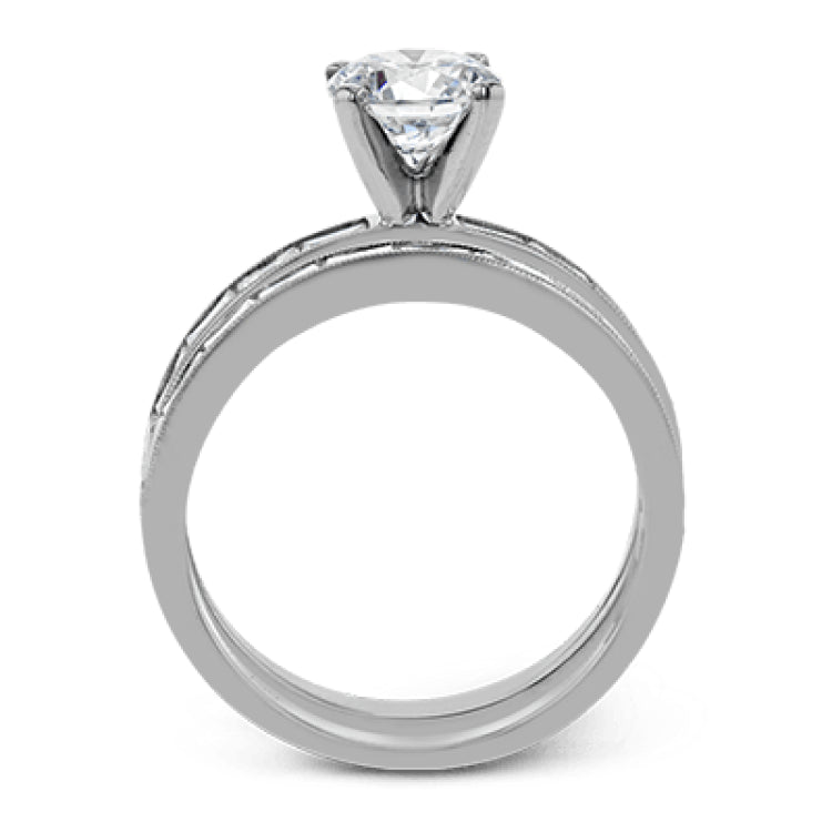 This sleek, minimalist white gold wedding set features a distinctive design with an impressive 1.05 ctw of baguette shaped white diamonds.