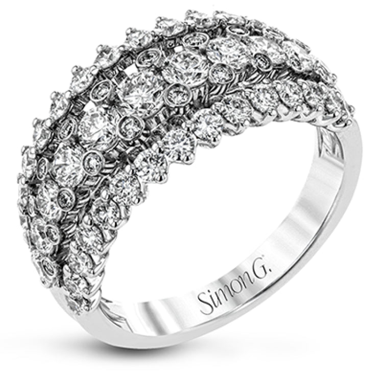 This unique white gold ring features a total of 1.74 ctw of white diamonds in an intricately designed setting.