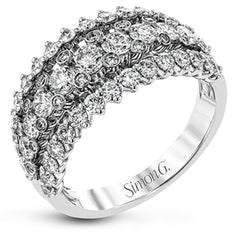 This unique white gold ring features a total of 1.74 ctw of white diamonds in an intricately designed setting.