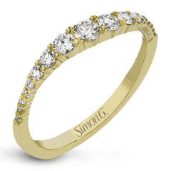 These interlocking 18k yellow gold band can be worn together with the rose and white gold bands , producing the look of one larger ring, or on their own for a simple statement. Each contains .45 ctw of shining white diamonds. Perfect for stacking.