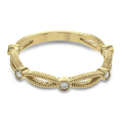These detailed bands in 18k gold can be worn together or paired with other rings. Each one features .11 ctw of shining white diamonds. Perfect for stacking.
