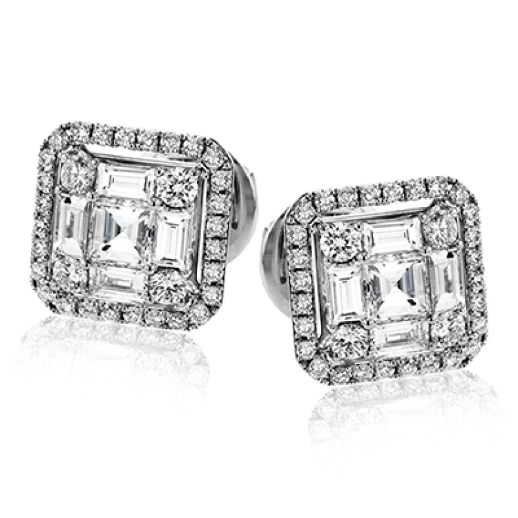 These stud earrings are the perfect addition to any outfit, showcasing a mosaic of square, baguette, and round diamonds.