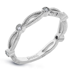 These detailed bands in 18k gold can be worn together or paired with other rings. Each one features .11 ctw of shining white diamonds. Perfect for stacking.