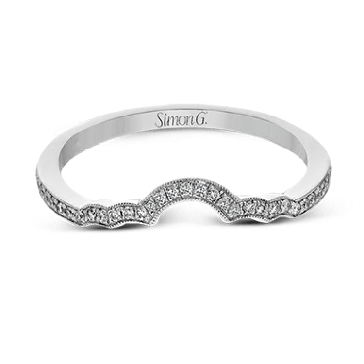This lovely contemporary design features white gold and .14 ctw of round white diamonds and .42 ctw of oval shaped white diamonds as well as delicate milgrain edging around its centerpiece.