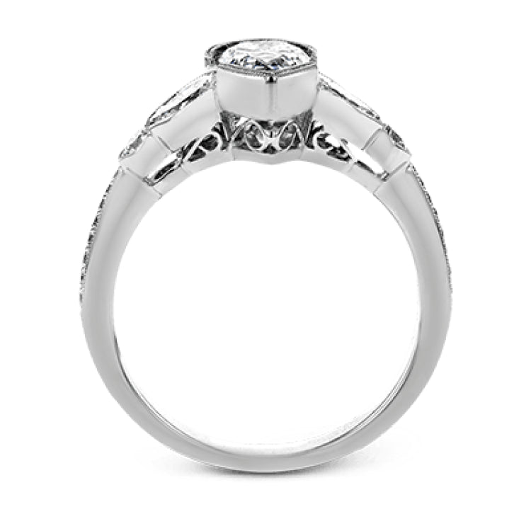 This lovely contemporary design features white gold and .14 ctw of round white diamonds and .42 ctw of oval shaped white diamonds as well as delicate milgrain edging around its centerpiece.