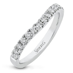 This gorgeous engagement ring makes quite the appearance with .83 ctw of round diamonds along with .83 ctw of baguette diamonds.