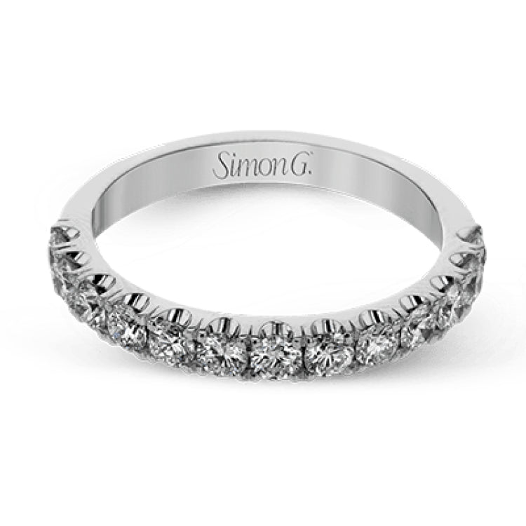 This wedding band has a beautiful timeless design which will be in style for years. The ring contains .77 ctw of white diamonds.