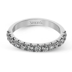 This wedding band has a beautiful timeless design which will be in style for years. The ring contains .77 ctw of white diamonds.