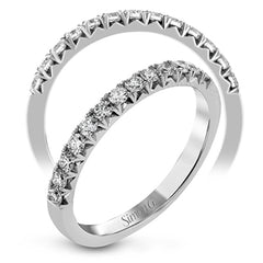 This delicate band contains .36 ctw of white diamonds which are specially set to showcase their sparkle.