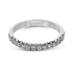 This delicate band contains .36 ctw of white diamonds which are specially set to showcase their sparkle.