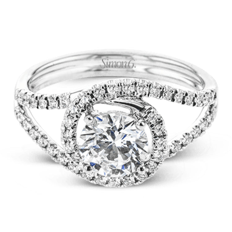 Crafted in the highest quality platinum, this engagement ring design features a two overlapping loops encircling the center stone set with .25 ctw of white diamonds.