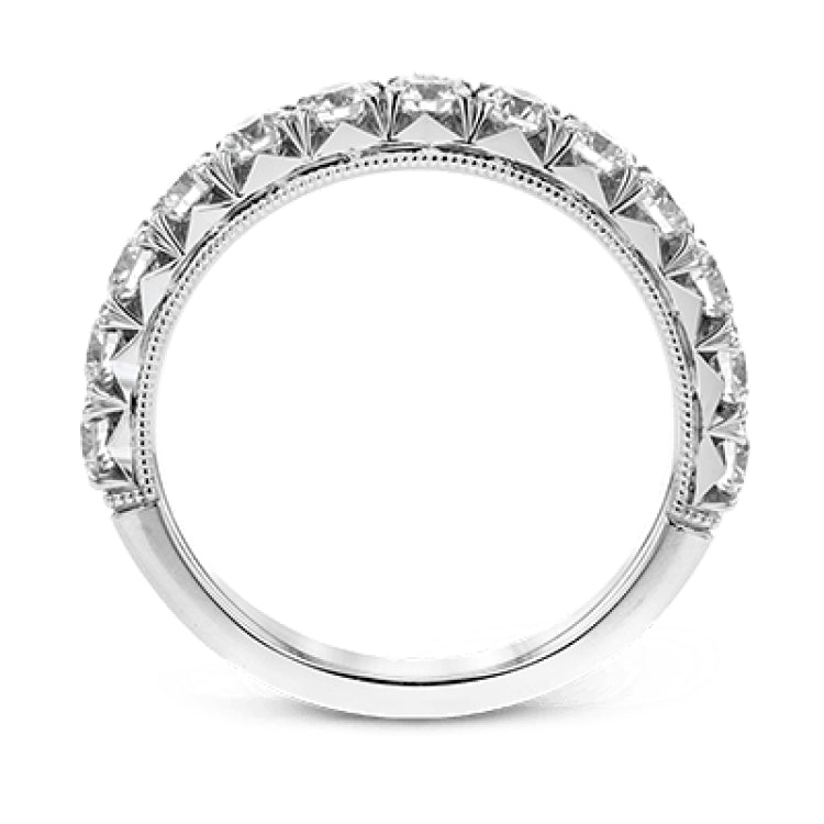 This classic wedding band features a distinctive setting style that shows off the .97 ctw of white diamonds to their full advantage.