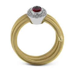 This unique right hand ring of gold coils wraps your finger in luxury and features an oval Ruby 0.57 ctw. surrounded by a halo of wite diamonds 0.14 ctw.