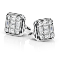 These statement stud earrings are made from 18k white gold and contains 9 smaller diamond which make up the larger look. These earrings contain .21 ctw of round diamonds, .49 ctw of princess cut diamonds, and .62 ctw of baguette diamonds.