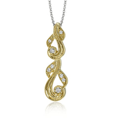 This 18k white gold pendant has a filigree design accented with vintage-inspired milgrain and .17 ctw of white round diamonds.