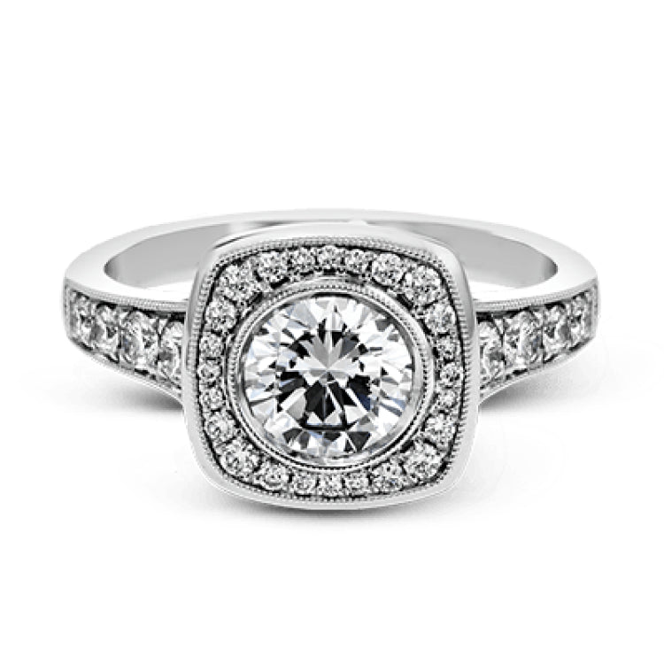 This exquisite white gold ring features a square halo and milgrain detail along with .49 ctw of round white diamond accents.