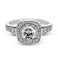 This exquisite white gold ring features a square halo and milgrain detail along with .49 ctw of round white diamond accents.