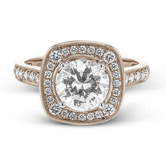 This rose gold ring radiates timeless beauty with the help of .39 ctw of round white diamond accents.