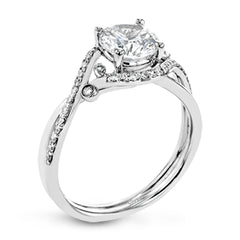 This nature inspired 18K engagement ring has a simple twist design with a combination of high polish gold band and .20 ctw RD diamonds leading up to the center