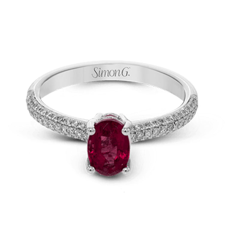 This graceful ring features .31 ctw of white diamonds set into the ring with a .90 ctw ruby.