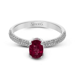 This graceful ring features .31 ctw of white diamonds set into the ring with a .90 ctw ruby.