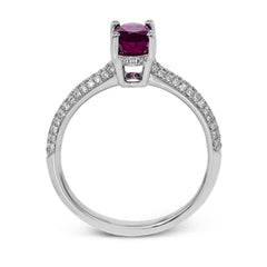 This graceful ring features .31 ctw of white diamonds set into the ring with a .90 ctw ruby.
