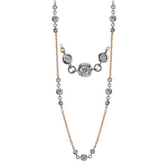 Contemporary and stylish, this necklace design contains 1.02 ctw of white diamonds in various sizes set with 18k white and rose gold.