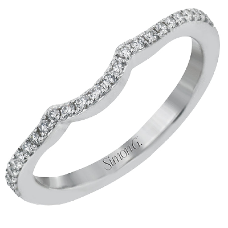 This intricate vintage-inspired engagement ring has two accent sapphire side stone totaling .25 ctw, while .33 ctw of white diamonds sparkle on the rest of the setting.