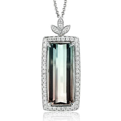 Clean lines and .32 ctw of shimmering white diamonds let 7.55 ctw of gorgeous watermelon tourmaline take center stage in this elegant white gold pendant