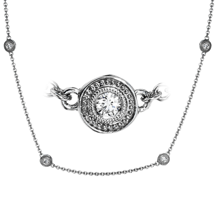 This 18k white gold necklace is a modern design containing .25 ctw of bezel-set white diamonds.