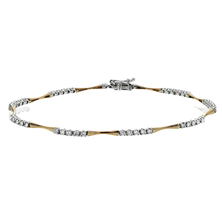 With a contemporary wavy style, this 18k rose and white gold bracelet set with .84 ctw of diamonds is sure to stand out.