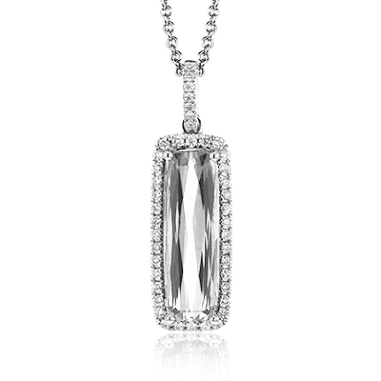 This sleek, vintage-inspired white gold pendant features .22 ctw of white diamonds framing a gorgeous 3.07ctw of green tourmaline
