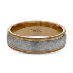 This classic men's wedding band features a matte texture in the center, edged by high polished metal. It is sure to be in style for years to come.