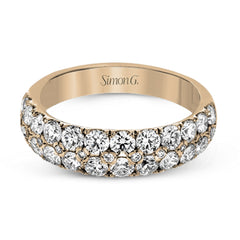 Simple yet elegant, this understated white gold band sparkles with 1.57 ctw of round white diamonds
