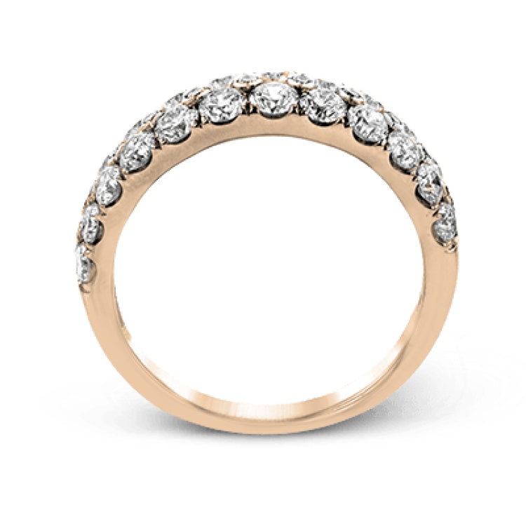 Simple yet elegant, this understated white gold band sparkles with 1.57 ctw of round white diamonds