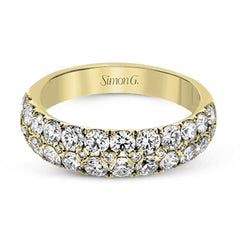 Simple yet elegant, this understated white gold band sparkles with 1.57 ctw of round white diamonds