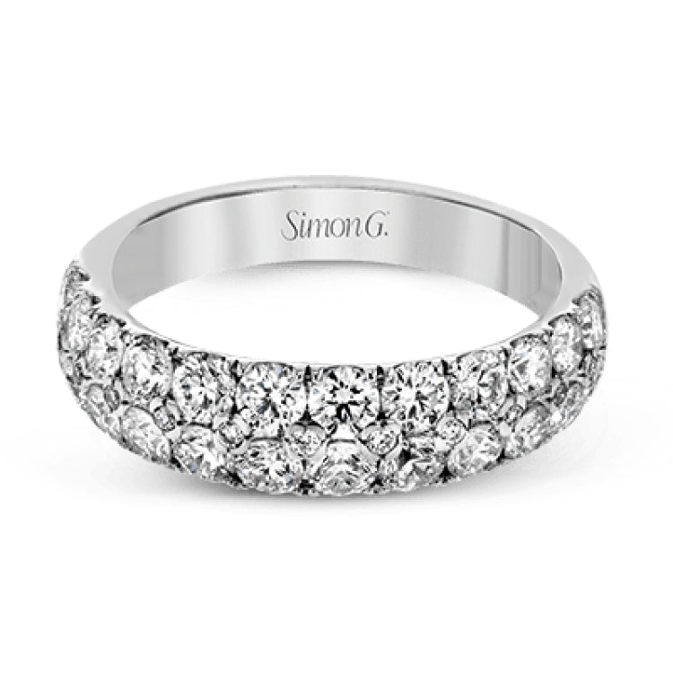 Simple yet elegant, this understated white gold band sparkles with 1.57 ctw of round white diamonds