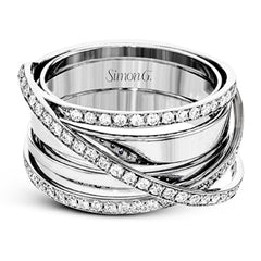 This modern, dynamic ring features an overlapping design of shiny high polished 18k white gold and rows of sparking white diamonds. The ring contains .50 ctw of round diamonds.